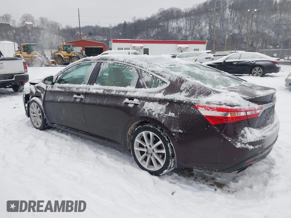 2014 Toyota Avalon Limited with VIN 4T1BK1EB1EU106004, listed as a IAAI auction lot 41341771 with 86,608 mi miles and . Bid and sale history available at DreamBid. Image 3.