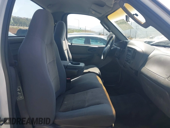 2003 Ford F-150 XL with VIN 2FTPF17Z03CA86883, listed as a IAAI auction lot 42169915 with Not provided miles and . Bid and sale history available at DreamBid. Image 5.