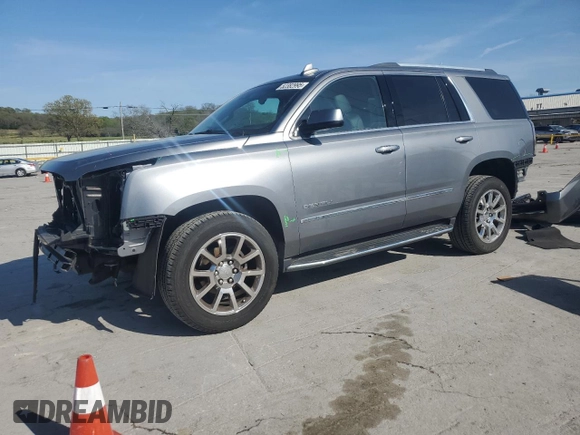 2018 GMC Yukon Denali with VIN 1GKS2CKJ7JR144608, listed as a Copart auction lot 52382995 with 71,956 mi miles and Salvage Title. Bid and sale history available at carsss.com. Image 1.