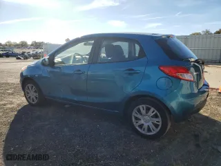 2012 Mazda Mazda2 Sport with VIN JM1DE1KZ6C0142958, listed as a Copart auction lot 74928544 with 66,091 mi miles and Non Repairable. Bid and sale history available at carsss.com. Image 2.