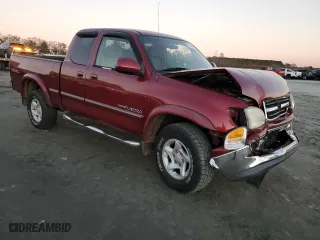 2001 Toyota Tundra Ltd with VIN 5TBBT48151S214199, listed as a Copart auction lot 81174404 with 165,256 mi miles and Salvage Title. Bid and sale history available at carsss.com. Image 4.