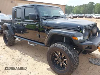 2021 Jeep Gladiator Willys with VIN 1C6HJTAG7ML514114, listed as a IAAI auction lot 42399793 with 78,829 mi miles and . Bid and sale history available at DreamBid. Image 1.