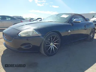 2007 Jaguar XK with VIN SAJDA44B375B02282, listed as a IAAI auction lot 42046463 with 117,595 mi miles. Bid and sale history available at carsss.com. Image 2.
