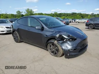2024 Tesla Model Y Long Range z VIN 7SAYGDEE9RF186388, wystawiony jako Copart lot #58471595 z przebiegiem 23 185 mil mil oraz Szkoda całkowita • Salvage title. Historia ofert i sprzedaży dostępna na DreamBid. Obrazek 4.