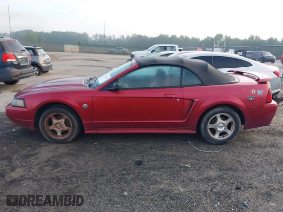 2004 Ford Mustang Deluxe with VIN 1FAFP44604F212319, listed as a IAAI auction lot 42100591 with 191,992 mi miles. Bid and sale history available at carsss.com. Image 13.