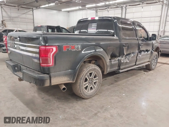 2015 Ford F-150 XLT w/HD Payload Pkg with VIN 1FTFW1EGXFFA39852, listed as a IAAI auction lot 41769971 with 163,929 mi miles. Bid and sale history available at carsss.com. Image 4.