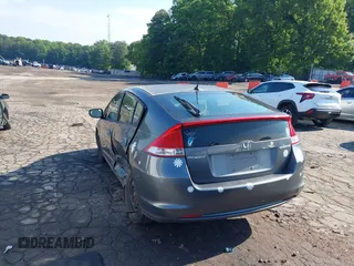 2010 Honda Insight LX with VIN JHMZE2H52AS032697, listed as a IAAI auction lot 42255794 with 262,251 mi miles and . Bid and sale history available at DreamBid. Image 3.