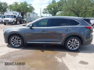 2016 Mazda CX-9 Signature with VIN JM3TCBEY9G0100579, listed as a IAAI auction lot 42282293 with 142,700 mi miles and . Bid and sale history available at DreamBid. Image 14.