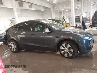 2023 Tesla Model Y Long Range with VIN 7SAYGDEE5PA033341, listed as a IAAI auction lot 41379625 with Not provided miles and . Bid and sale history available at DreamBid. Image 13.