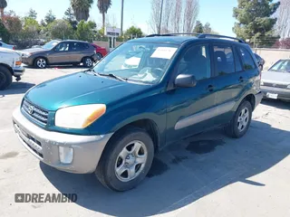 2003 Toyota RAV4 with VIN JTEGH20V936014264, listed as a IAAI auction lot 41845767 with 142,137 mi miles. Bid and sale history available at carsss.com. Image 2.