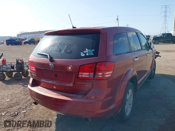 2009 Dodge Journey SXT with VIN 3D4GG57V19T523670, listed as a IAAI auction lot 41918151 with 181,218 mi miles. Bid and sale history available at carsss.com. Image 4.