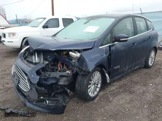 2016 Ford C-Max Energi SEL with VIN 1FADP5CU6GL108873, listed as a IAAI auction lot 41744658 with 1 mi miles. Bid and sale history available at carsss.com. Image 2.