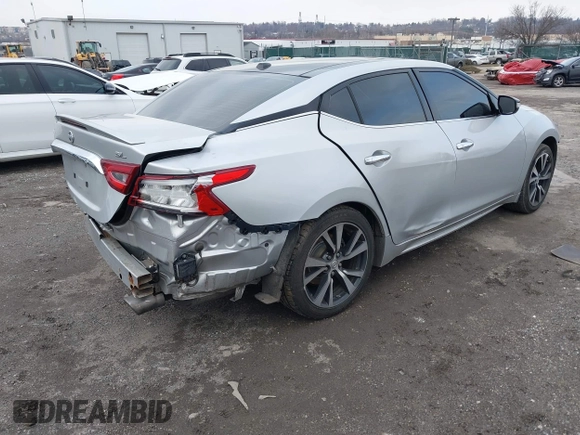 2016 Nissan Maxima SV with VIN 1N4AA6AP6GC416407, listed as a IAAI auction lot 41227003 with 125,781 mi miles and . Bid and sale history available at DreamBid. Image 4.