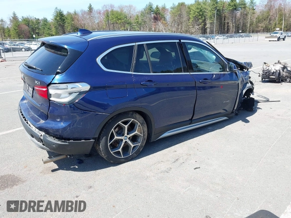2017 BMW X1 xDrive28i with VIN WBXHT3C39H5F71525, listed as a IAAI auction lot 42050272 with 118,875 mi miles. Bid and sale history available at carsss.com. Image 4.