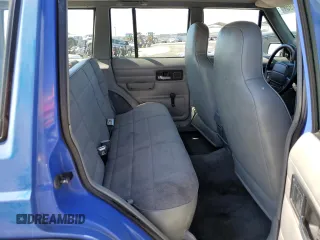 1996 Jeep Cherokee SE with VIN 1J4FT28S1TL108840, listed as a Copart auction lot 46951195 with 257,004 mi miles and Salvage Title. Bid and sale history available at carsss.com. Image 11.