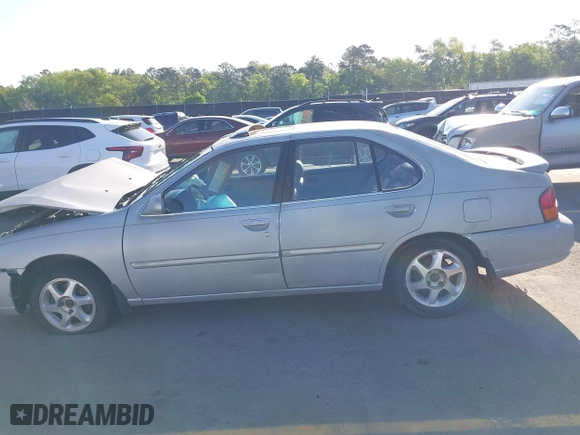 1999 Nissan Altima XE with VIN 1N4DL01D4XC252973, listed as a IAAI auction lot 42005504 with 247,570 mi miles. Bid and sale history available at carsss.com. Image 13.