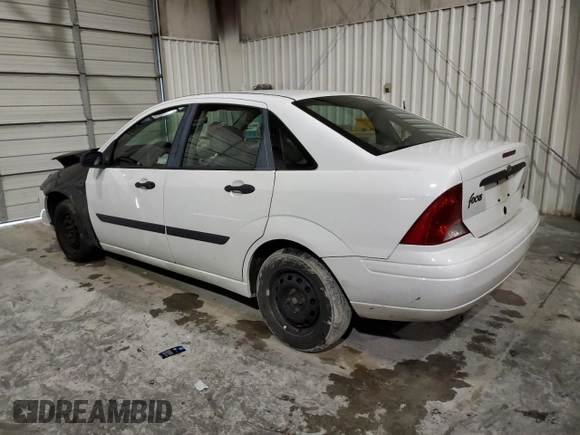 2002 Ford Focus LX with VIN 1FAFP33P52W126344, listed as a Copart auction lot 49757324 with 140,612 mi miles and Salvage Title. Bid and sale history available at DreamBid. Image 2.