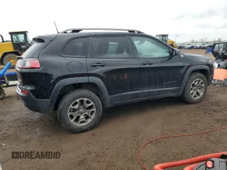 2020 Jeep Cherokee Trailhawk with VIN 1C4PJMBX2LD588381, listed as a Copart auction lot 56067055 with 82,467 mi miles and Salvage title. Bid and sale history available at DreamBid. Image 3.