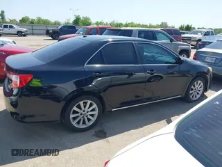 2014 Toyota Camry L with VIN 4T4BF1FK3ER413537, listed as a IAAI auction lot 42015577 with 181,592 mi miles. Bid and sale history available at carsss.com. Image 13.