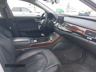 2016 Audi A8 Sport z VIN WAU43AFD3GN011061, wystawiony jako IAAI lot #42034532 z przebiegiem 109 877 mil mil oraz . Historia ofert i sprzedaży dostępna na DreamBid. Obrazek 5.
