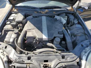 2001 Mercedes-Benz SLK-Class with VIN WDBKK65F71F175734, listed as a Copart auction lot 61874984 with 185,408 mi miles and Salvage Title. Bid and sale history available at carsss.com. Image 11.