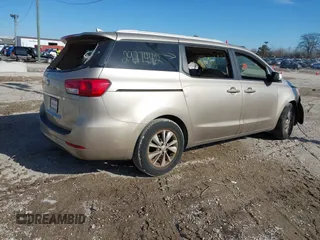 2015 Kia Sedona LX with VIN KNDMB5C15F6033787, listed as a IAAI auction lot 41534224 with 117,410 mi miles. Bid and sale history available at carsss.com. Image 4.
