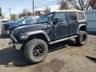 2020 Jeep Wrangler Unlimited Black and Tan with VIN 1C4HJXDG2LW191731, listed as a Copart auction lot 54689545 with 77,448 mi miles and Salvage title. Bid and sale history available at DreamBid. Image 1.
