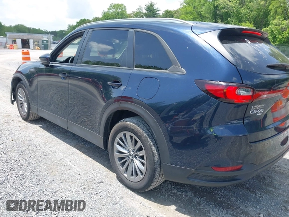 2024 Mazda CX-90 Select z VIN JM3KKAHD4R1142933, wystawiony jako IAAI lot #42269979 z przebiegiem 30 373 mil mil oraz . Historia ofert i sprzedaży dostępna na DreamBid. Obrazek 3.