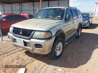 2000 Mitsubishi Montero LS z VIN JA4MT31HXYP020087, wystawiony jako IAAI lot #41540609 z przebiegiem 262 474 mil mil oraz . Historia ofert i sprzedaży dostępna na DreamBid. Obrazek 2.