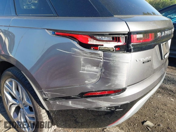 2020 Land Rover Range Rover Velar S z VIN SALYB2EXXLA295307, wystawiony jako IAAI lot #41971330 z przebiegiem 12 192 mil mil oraz . Historia ofert i sprzedaży dostępna na DreamBid. Obrazek 6.