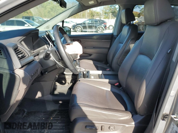 2020 Honda Odyssey EX-L with VIN 5FNRL6H73LB056720, listed as a Copart auction lot 87205024 with 60,219 mi miles and Salvage Title. Bid and sale history available at carsss.com. Image 7.