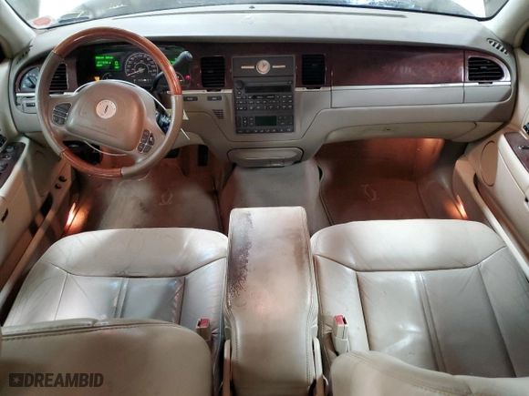 2003 Lincoln Town Car Cartier with VIN 1LNHM83W53Y623587, listed as a Copart auction lot 83599884 with 127,729 mi miles and Salvage Title. Bid and sale history available at carsss.com. Image 8.