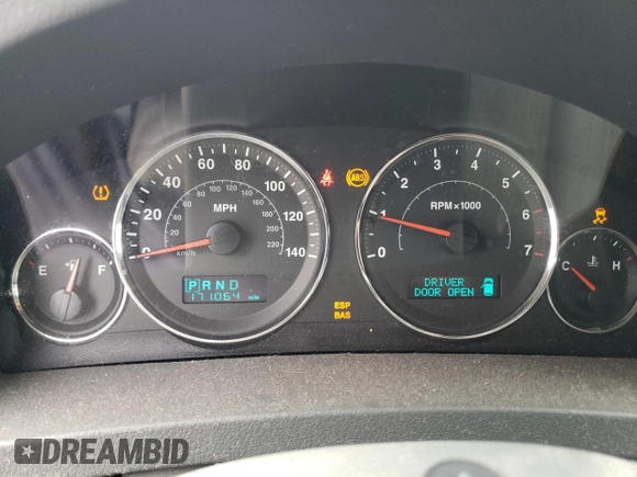 2007 Jeep Grand Cherokee Laredo with VIN 1J8GR48K77C569155, listed as a Copart auction lot 66904414 with 171,064 mi miles and Salvage Title. Bid and sale history available at carsss.com. Image 9.