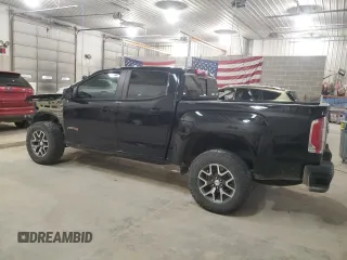 2021 GMC Canyon 4WD AT4 w/Cloth with VIN 1GTG6FEN2M1265863, listed as a Copart auction lot 49900865 with 50,102 mi miles and Salvage Title. Bid and sale history available at carsss.com. Image 2.