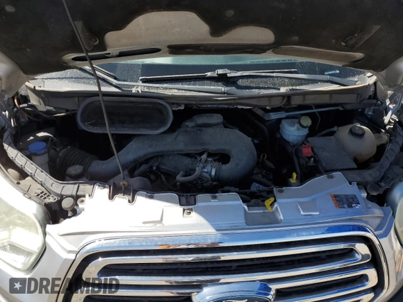 2015 Ford Transit XL with VIN 1FMZK1YMXFKB16362, listed as a Copart auction lot 57024515 with 112,665 mi miles and Salvage title. Bid and sale history available at DreamBid. Image 12.