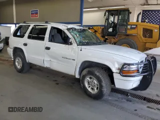 1999 Dodge Durango z VIN 1B4HS28Z2XF709089, wystawiony jako Copart lot #58241055 z przebiegiem 112 347 mil mil oraz Szkoda całkowita • Salvage title. Historia ofert i sprzedaży dostępna na DreamBid. Obrazek 4.
