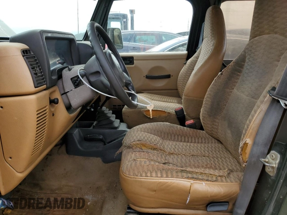 1998 Jeep Wrangler SE with VIN 1J4FY29P9WP767516, listed as a Copart auction lot 58149245 with 190,964 mi miles and Salvage title. Bid and sale history available at DreamBid. Image 7.