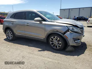 2017 Lincoln MKC Select with VIN 5LMCJ2C9XHUL34775, listed as a Copart auction lot 61188315 with 96,087 mi miles and Salvage title. Bid and sale history available at DreamBid. Image 4.