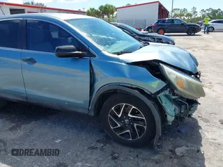 2016 Honda CR-V SE z VIN 2HKRM3H42GH556893, wystawiony jako IAAI lot #42255060 z przebiegiem 112 766 mil mil oraz . Historia ofert i sprzedaży dostępna na DreamBid. Obrazek 6.