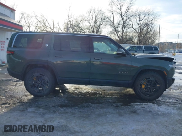 2024 Rivian R1S Launch Edition with VIN 7PDSGABL1RN035074, listed as a IAAI auction lot 41276556 with Not Provided miles. Bid and sale history available at carsss.com. Image 13.