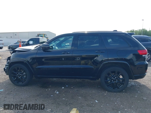 2021 Jeep Grand Cherokee Laredo E with VIN 1C4RJEAG0MC571375, listed as a IAAI auction lot 42087648 with 29,358 mi miles and . Bid and sale history available at DreamBid. Image 15.