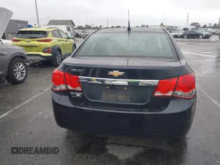 2014 Chevrolet Cruze LS z VIN 1G1PA5SHXE7351632, wystawiony jako IAAI lot #41795779 z przebiegiem 144 948 mil mil oraz . Historia ofert i sprzedaży dostępna na DreamBid. Obrazek 17.