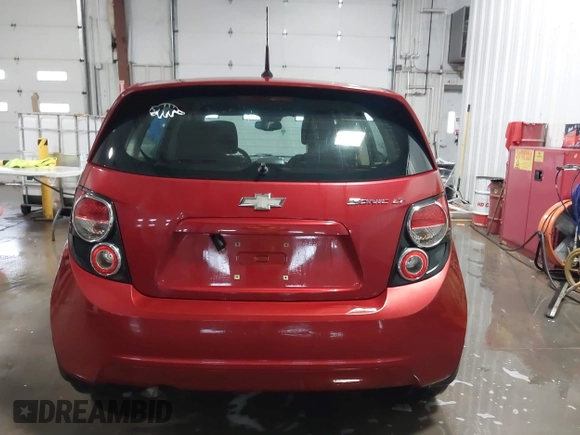 2013 Chevrolet Sonic LT with VIN 1G1JC6SH1D4116946, listed as a IAAI auction lot 41562425 with 116,815 mi miles. Bid and sale history available at carsss.com. Image 16.