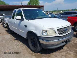2001 Ford F-150 z VIN 1FTPX17LX1KB15016, wystawiony jako IAAI lot #42320637 z przebiegiem 567 424 mil mil oraz . Historia ofert i sprzedaży dostępna na DreamBid. Obrazek 1.