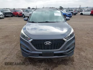 2016 Hyundai Tucson Eco with VIN KM8J3CA28GU217033, listed as a IAAI auction lot 41476238 with 76,311 mi miles. Bid and sale history available at carsss.com. Image 13.