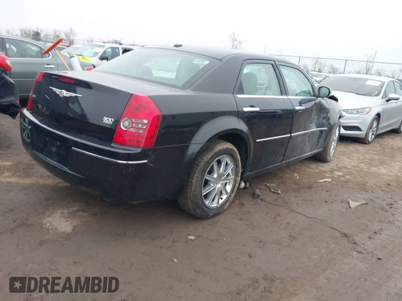 2010 Chrysler 300 Touring with VIN 2C3CK5CV5AH169539, listed as a IAAI auction lot 41560909 with 152,956 mi miles. Bid and sale history available at carsss.com. Image 4.