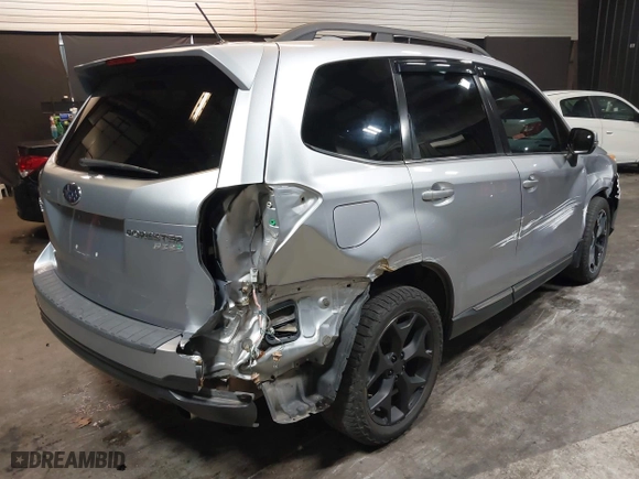 2015 Subaru Forester 2.5i Touring with VIN JF2SJAUC8FH468456, listed as a IAAI auction lot 41132284 with 188,408 mi miles. Bid and sale history available at carsss.com. Image 4.