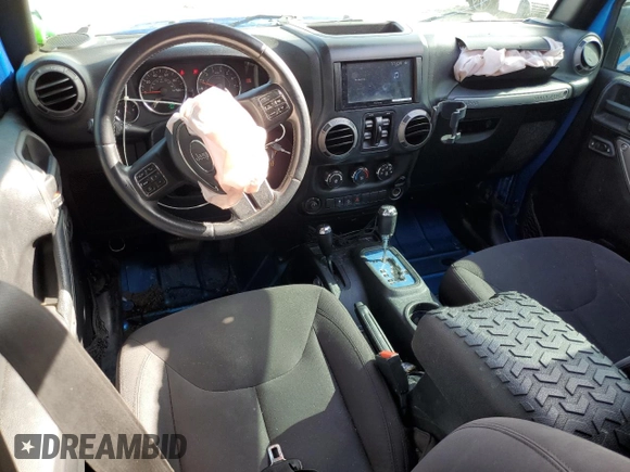 2015 Jeep Wrangler Unlimited Sport with VIN 1C4BJWDG1FL683558, listed as a Copart auction lot 59883545 with 107,267 mi miles and Salvage title. Bid and sale history available at DreamBid. Image 8.