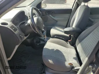 2007 Ford Focus S z VIN 1FAHP34N57W145697, wystawiony jako Copart lot #55335235 z przebiegiem 228 416 mil mil oraz Nie do naprawy • Non repairable. Historia ofert i sprzedaży dostępna na DreamBid. Obrazek 7.