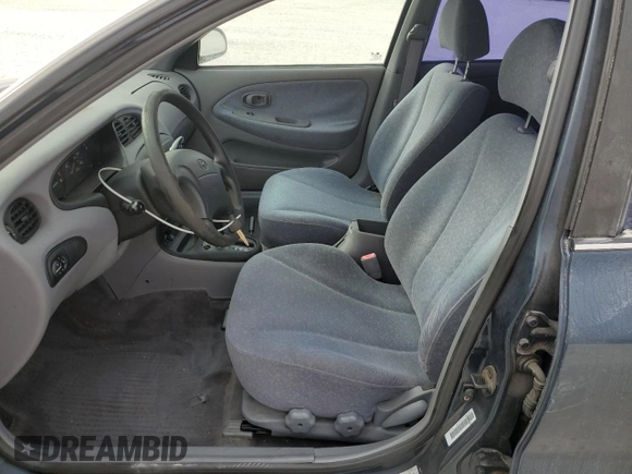 2000 Hyundai Elantra GLS z VIN KMHJF35F9YU032902, wystawiony jako Copart lot #45145955 z przebiegiem 79 229 mil mil oraz Czysty tytuł • Clean title. Historia ofert i sprzedaży dostępna na DreamBid. Obrazek 7.